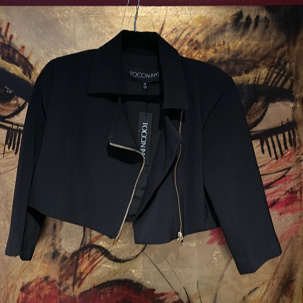 BRAND NEW Black Blazer with gorgeous gold zipper closure and on both sleeves.